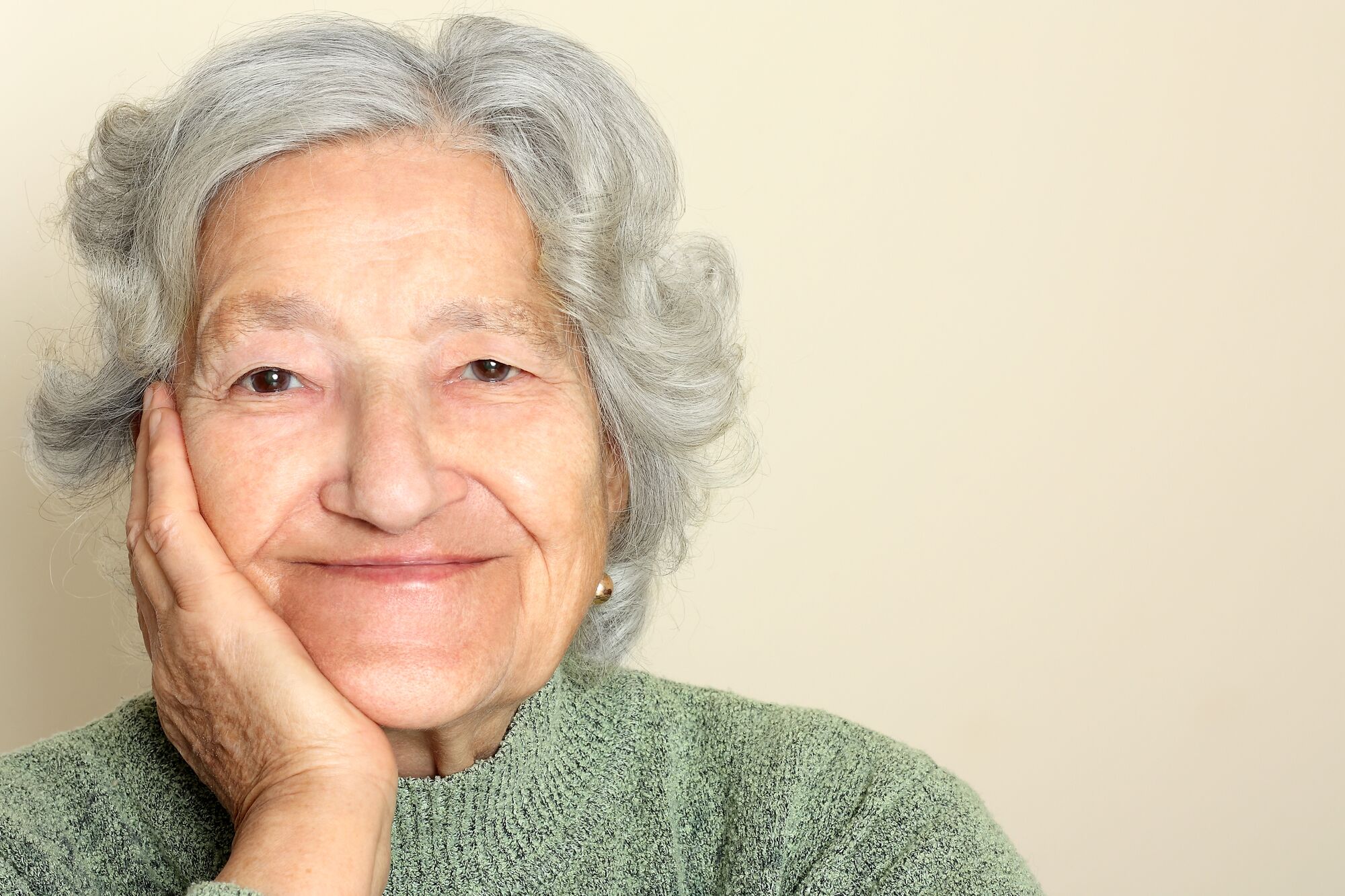A smiling elderly woman